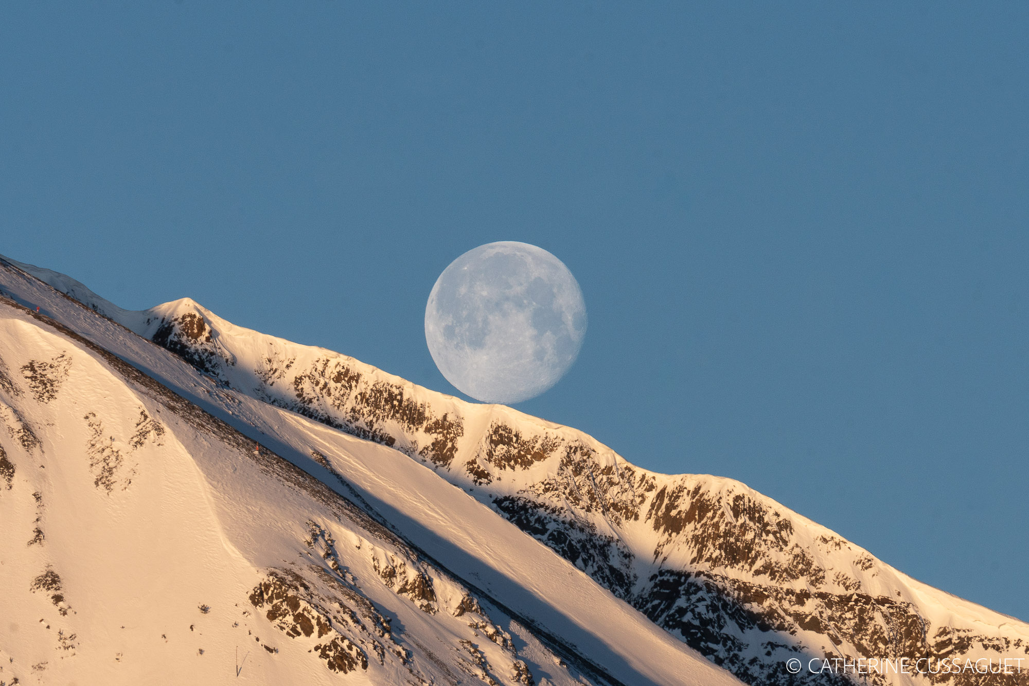 Moon and snowy mountain