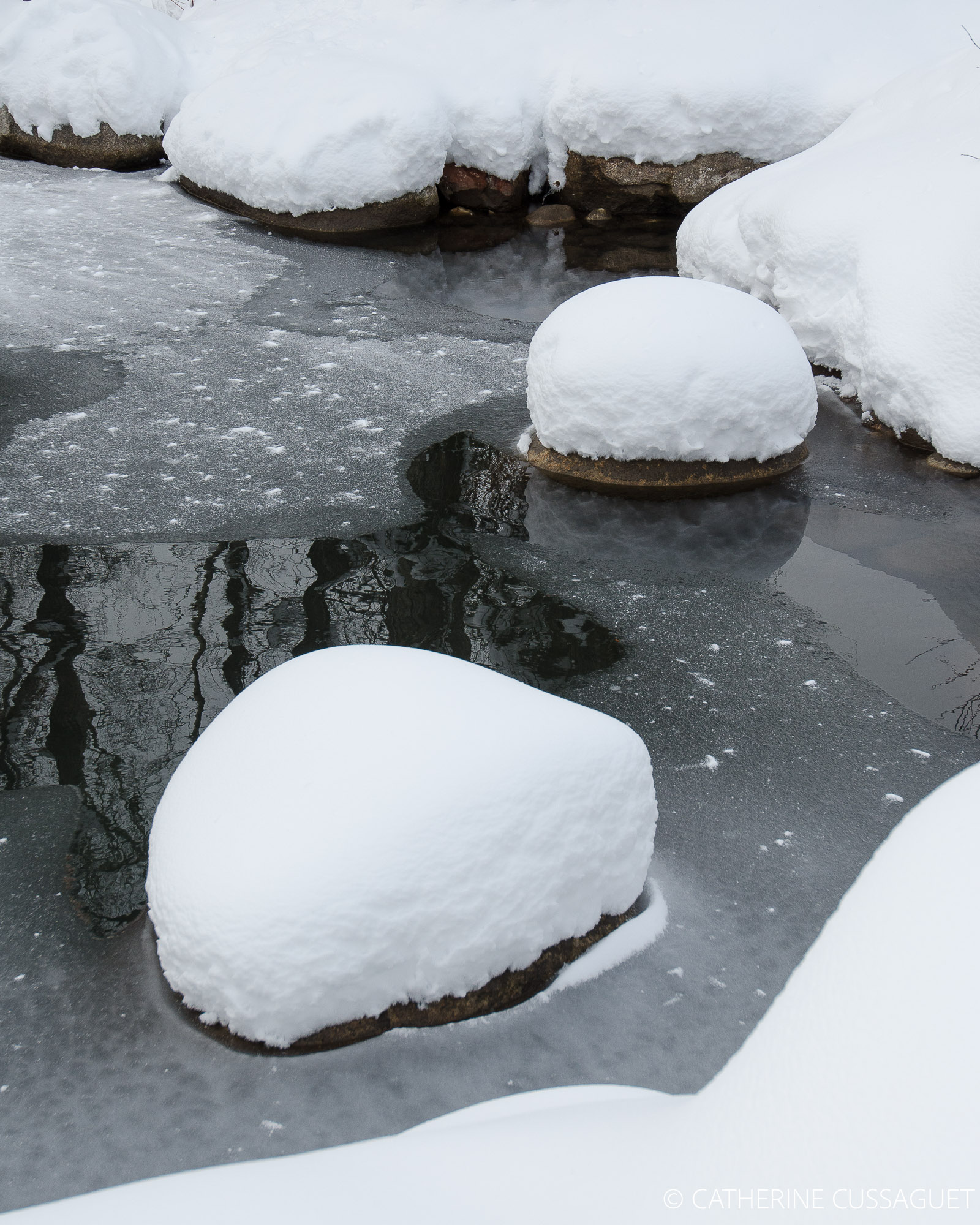 Boulders covered by snow