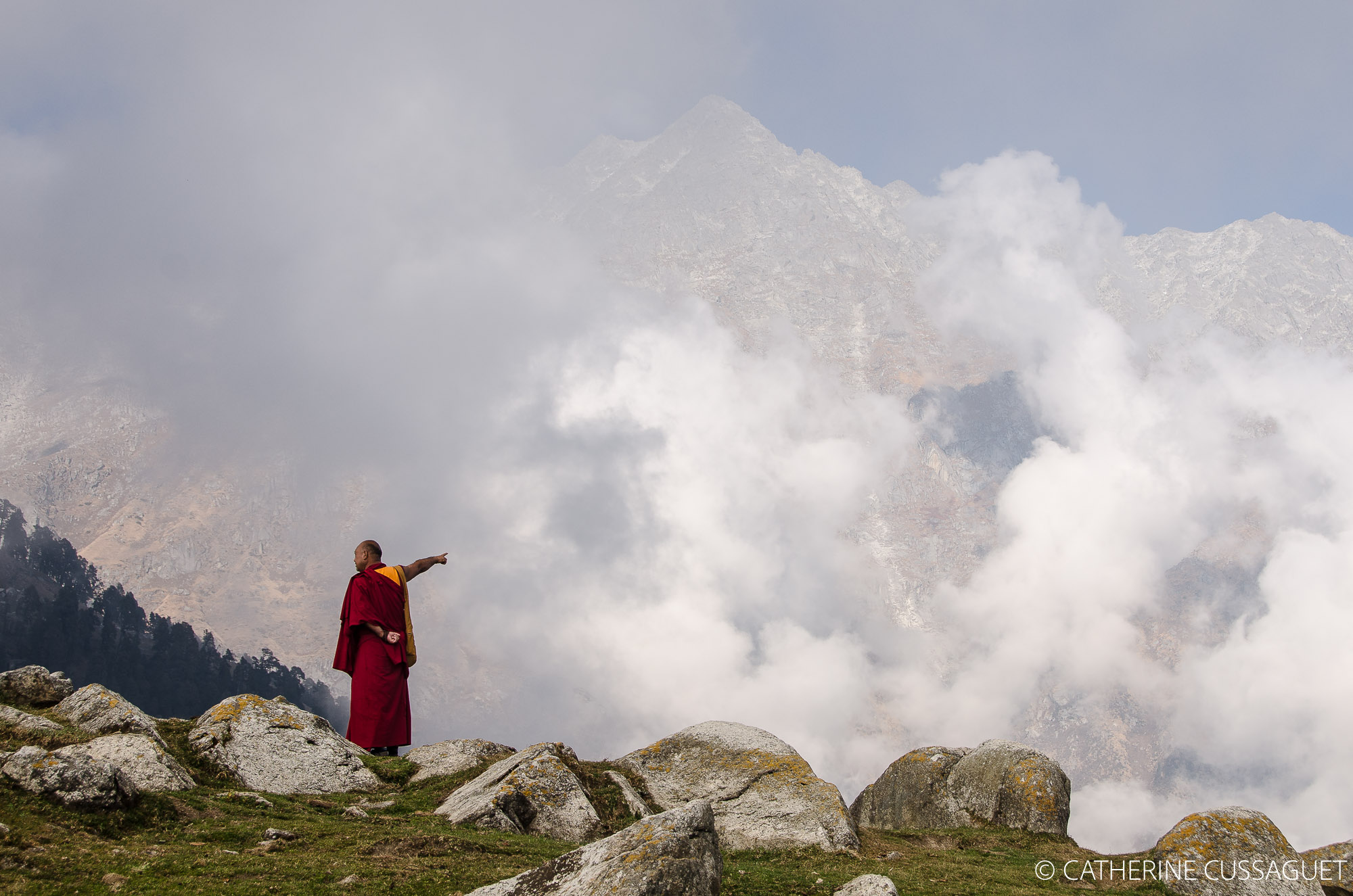 red robe monk and mountain