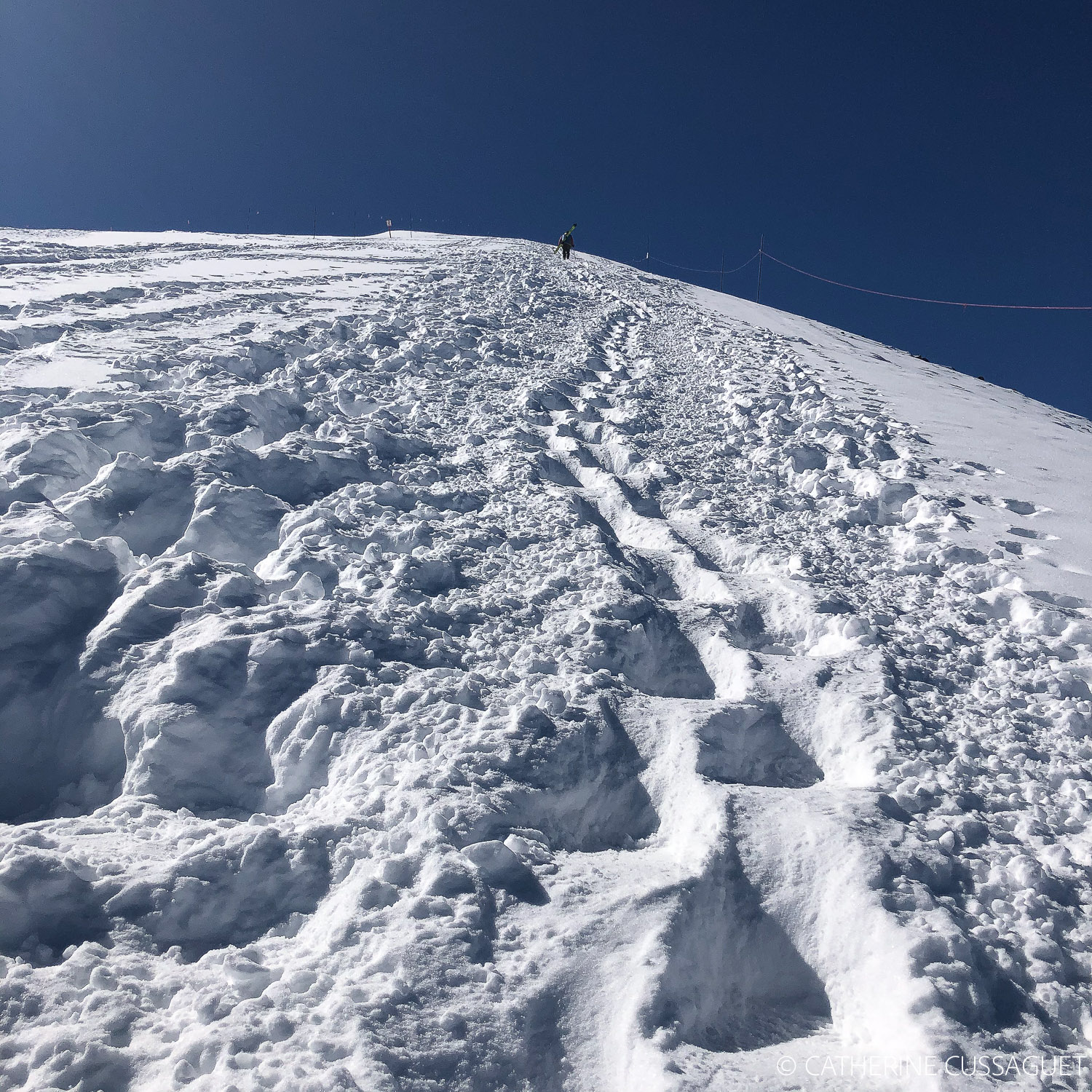 steps in snow, steep mountain